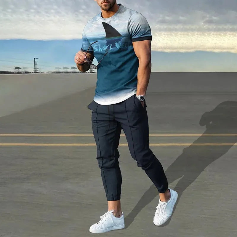Man wearing a thin, short-sleeve polyester blend pullover and matching trousers from a sports tracksuit set.