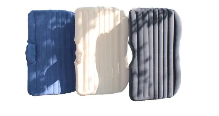 Universal inflatable car bed with flocking material, shown with pump, pillows, and storage bag.