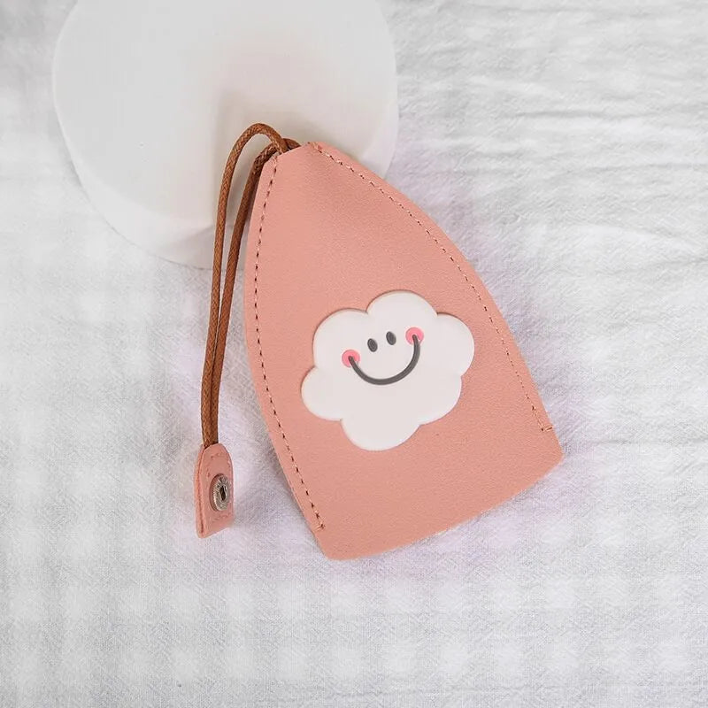 Cartoon pull-out key case in PU leather measuring 14 by 7.5 centimetres