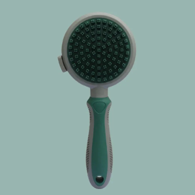 Two-sided silicone cat hair brush showing retractable slicker brush and octopus-teethed massager sides on green background