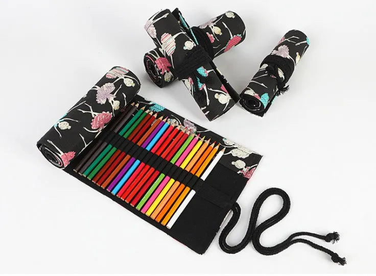 Square canvas rolling pencil case with ballet girl print, unfurled to show multiple pencil slots.