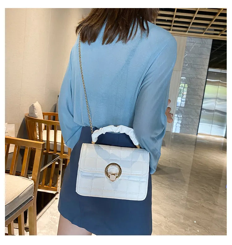 Women's solid colour PU leather small square crossbody bag with messenger chain in Black, Purple, and White