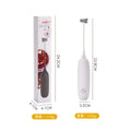 Black and white hand-held electric milk frother blender for coffee