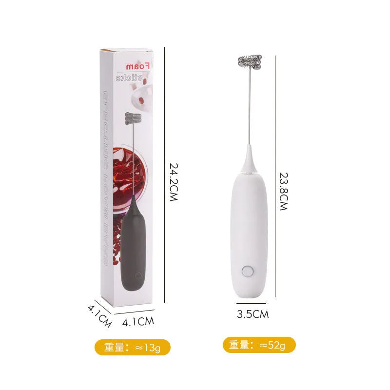 Black and white hand-held electric milk frother blender for coffee