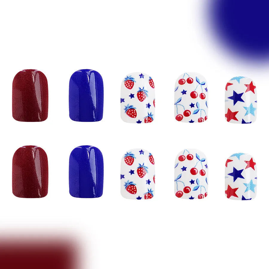 24 short glossy nail stickers with red and blue strawberry and cherry pattern