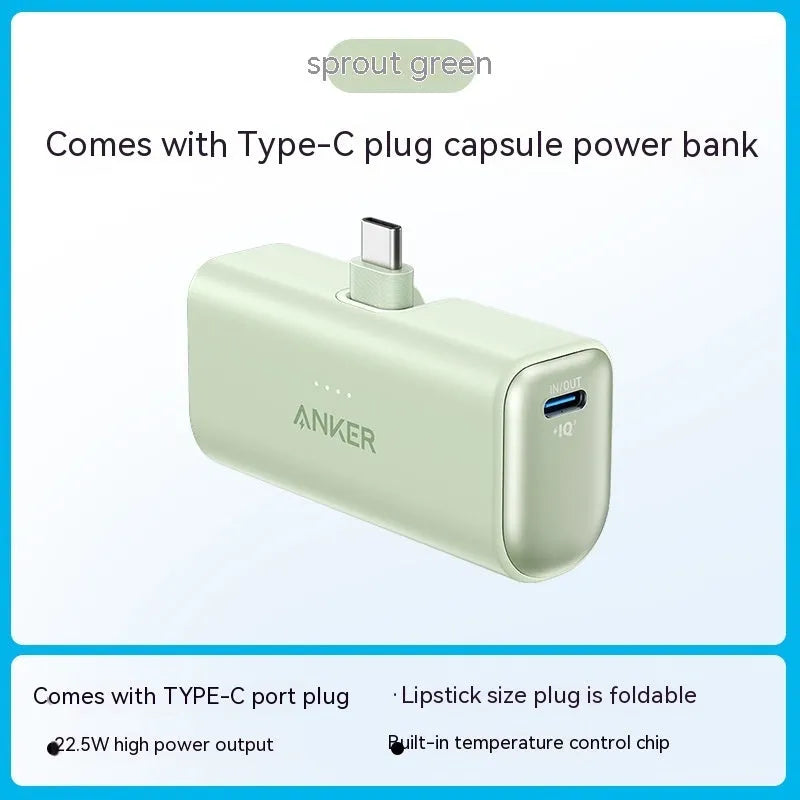 Small capsule-shaped power bank in five colours with a foldable USB-C cable attached
