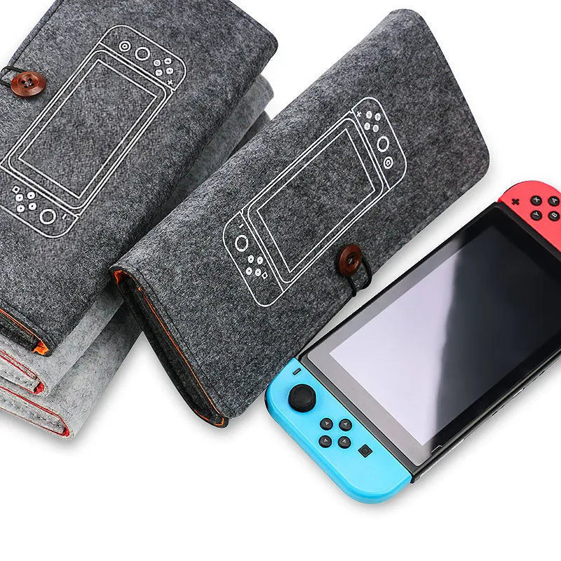 Black felt pouch for Nintendo Switch console with game card slots and double storage layer.