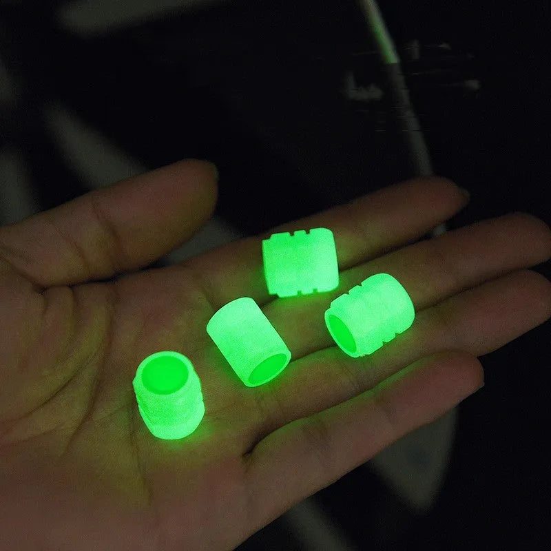 Glow-in-the-dark rubber car tyre valve caps in a set, showing size and luminous feature.