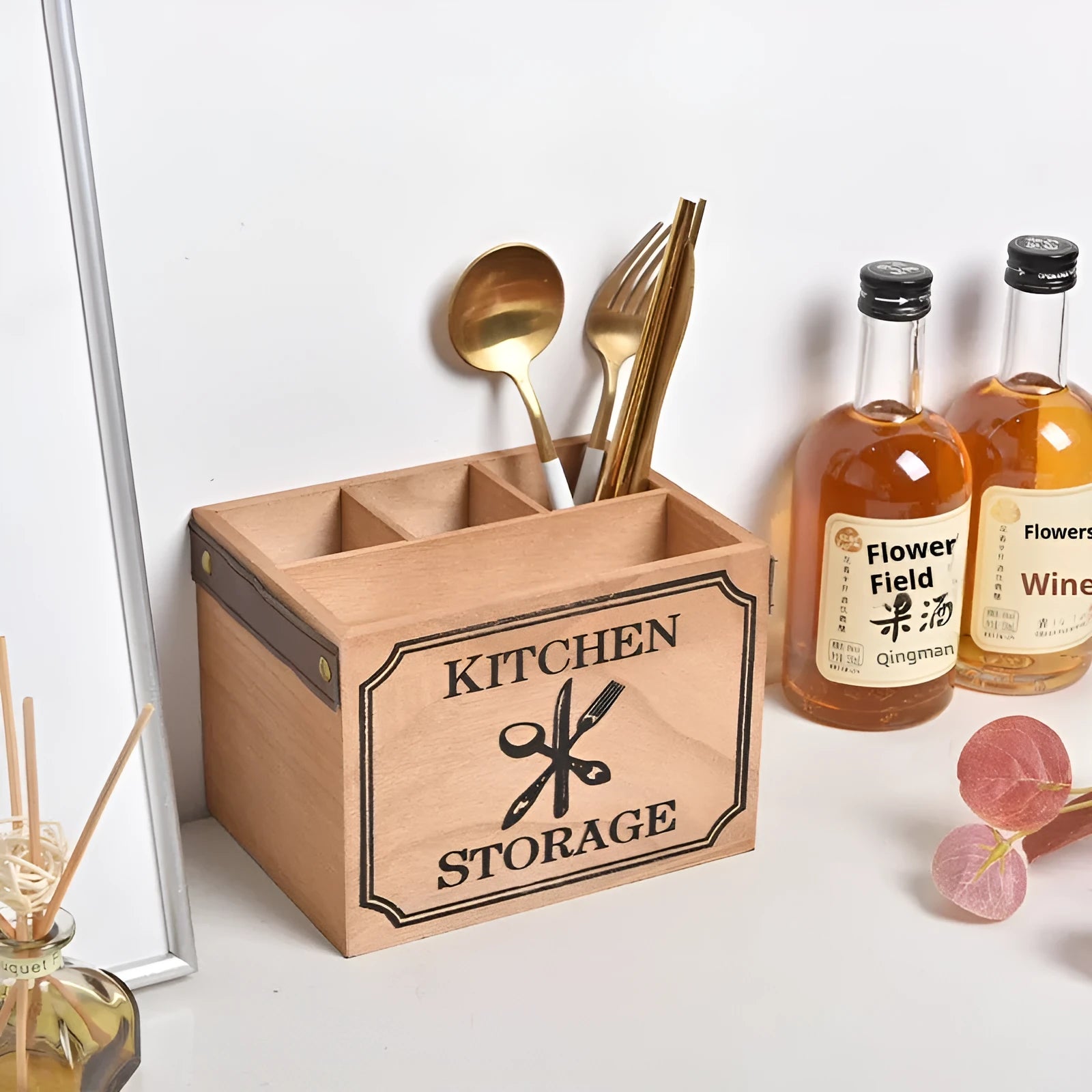 Wooden kitchen storage box for knives, forks, and chopsticks with internal dividers.