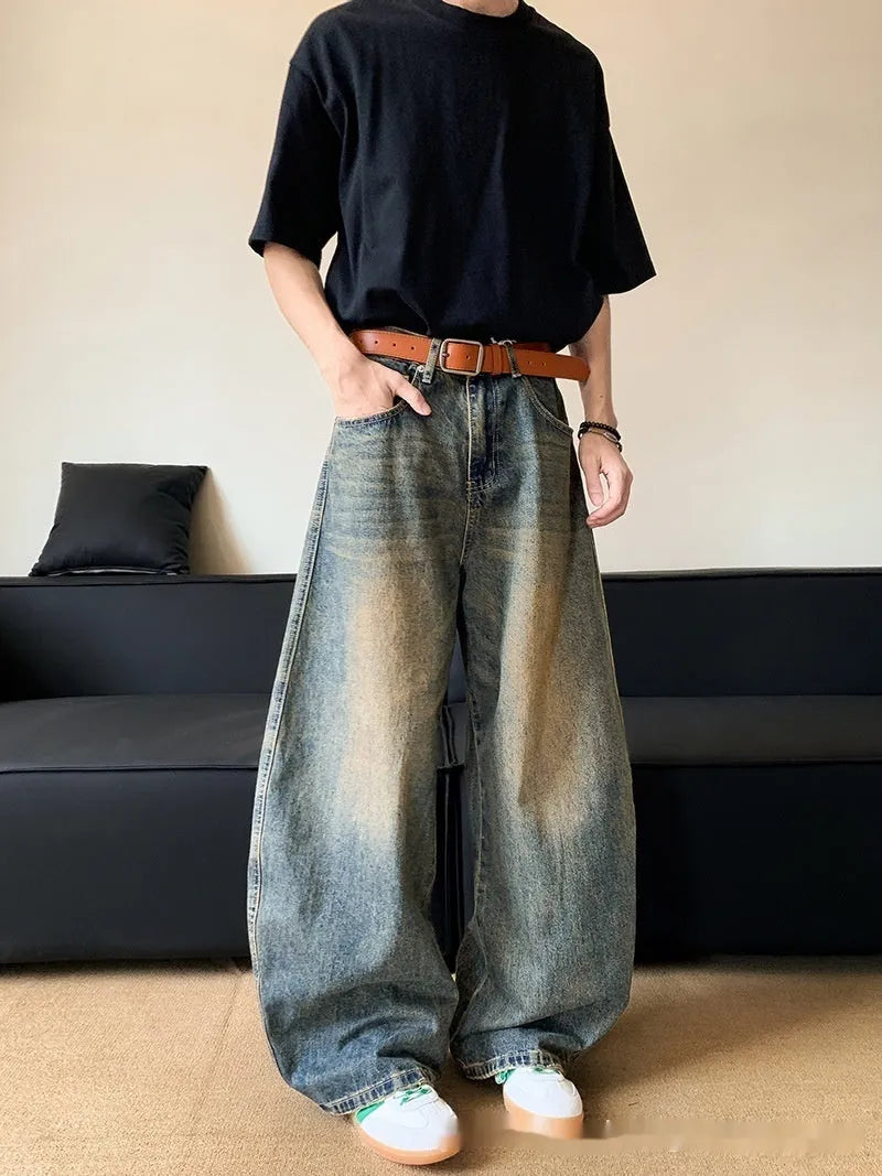 Men's retro blue distressed jeans with wide-leg cut and micro-elastic cotton blend fabric