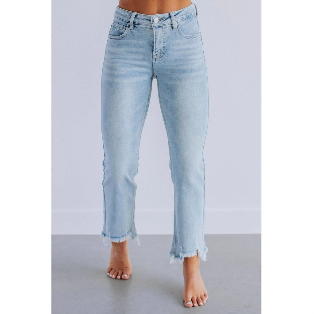 Women's straight leg denim jeans in dark blue and light blue, showcasing hand-worn craft details on cotton fabric.