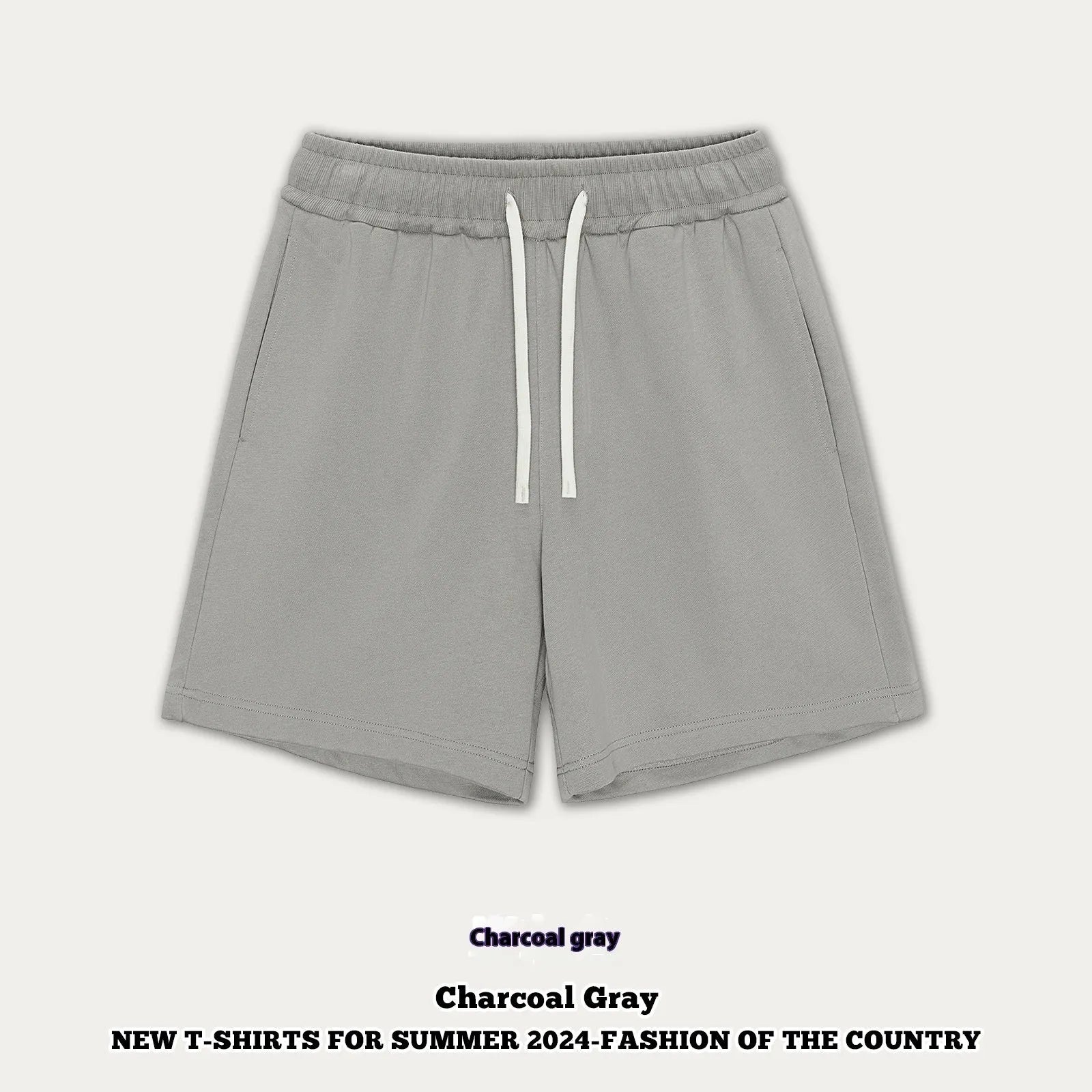 Loose-fit cotton denim shorts for baby or toddler in charcoal grey colour on a hanger.