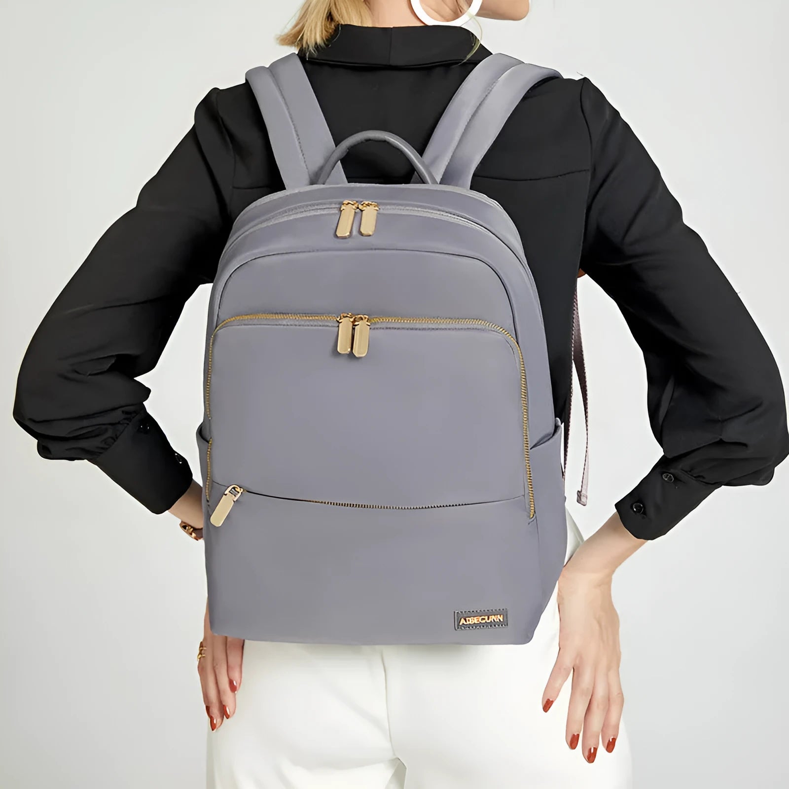 Large capacity black Oxford cloth women's backpack with multiple compartments.