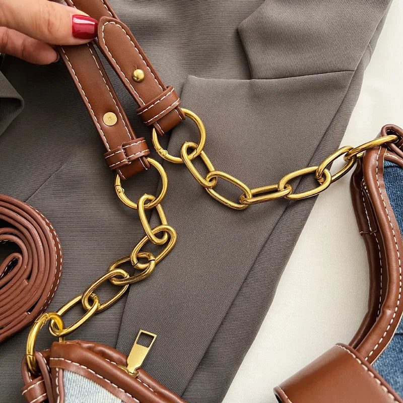 Brown denim women's shoulder bag with chain straps and bucket design showing phone compartment