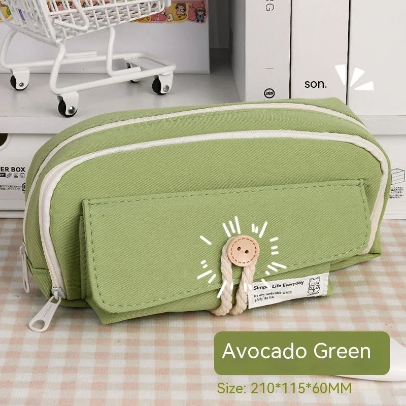 Korean-style canvas pencil case in green, beige, blue or grey holding multiple pens
