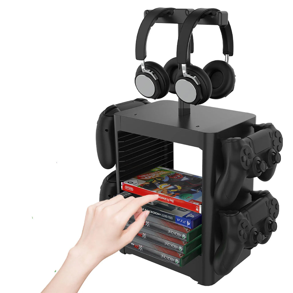 Black gaming console CD storage rack with headphone top, side controller hooks, and bottom accessory drawer