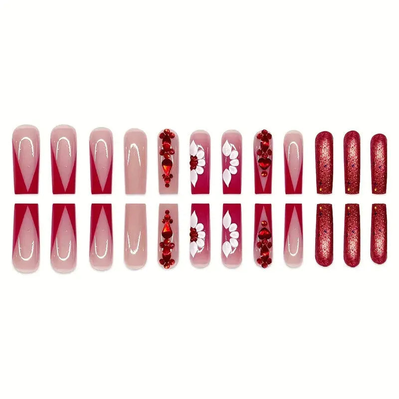 Artificial nails with red floral pattern and prismatic diamond decorations in long square shape