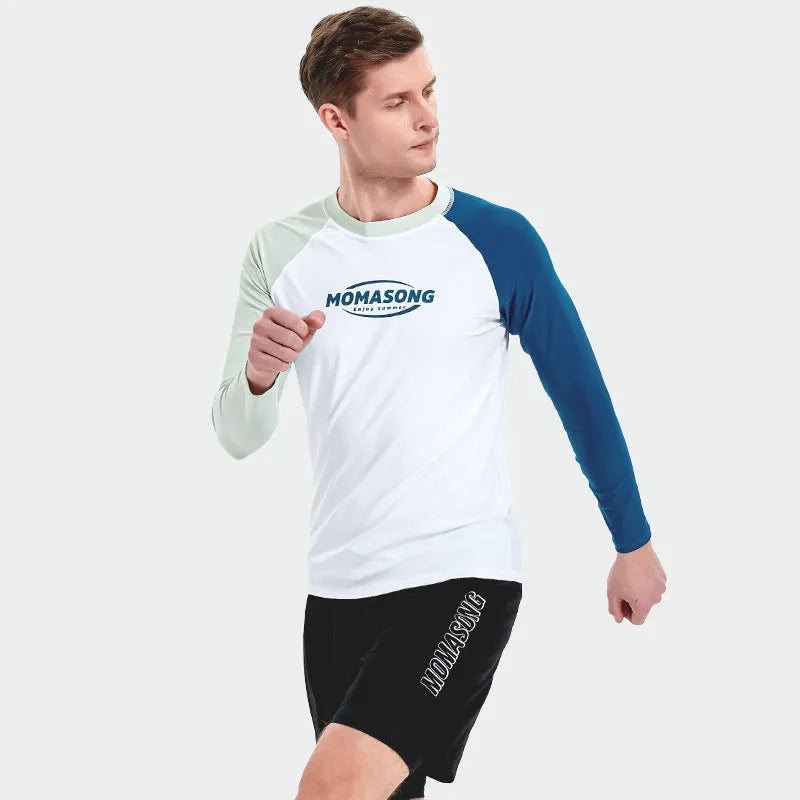 Man wearing a white long-sleeved swim top and matching swim trunks set for beach or pool.