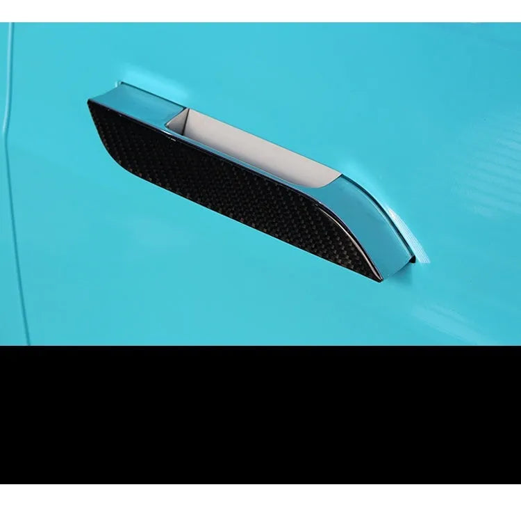 Set of four carbon fibre adhesive protection patches for Tesla Model S door handles.