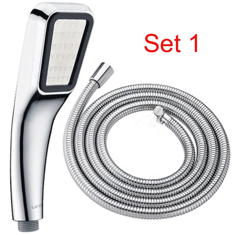 Hand-held pressurised rain shower head in orange and seven set configurations