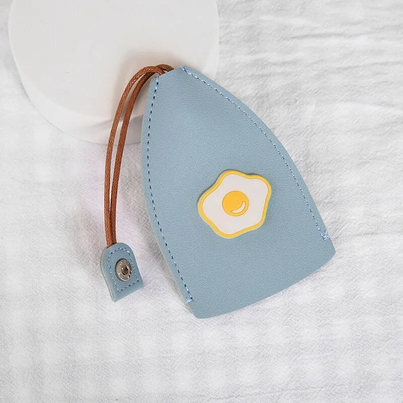 Cartoon pull-out key case in PU leather measuring 14 by 7.5 centimetres