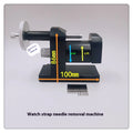 Alloy steel watch strap stripping machine tool on a workbench for watch repair.