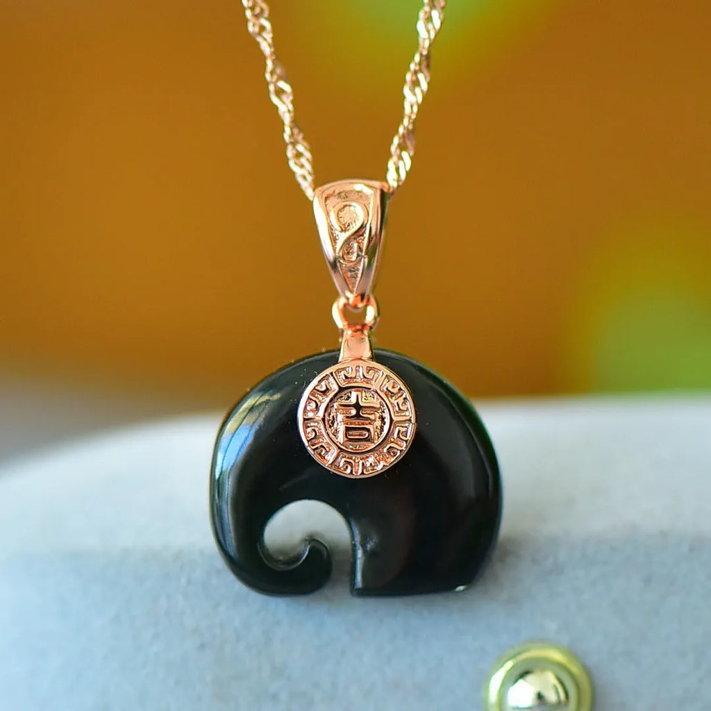 Flat natural grey Hetian jade pendant with copper inlay on a necklace chain, modern minimalist style.