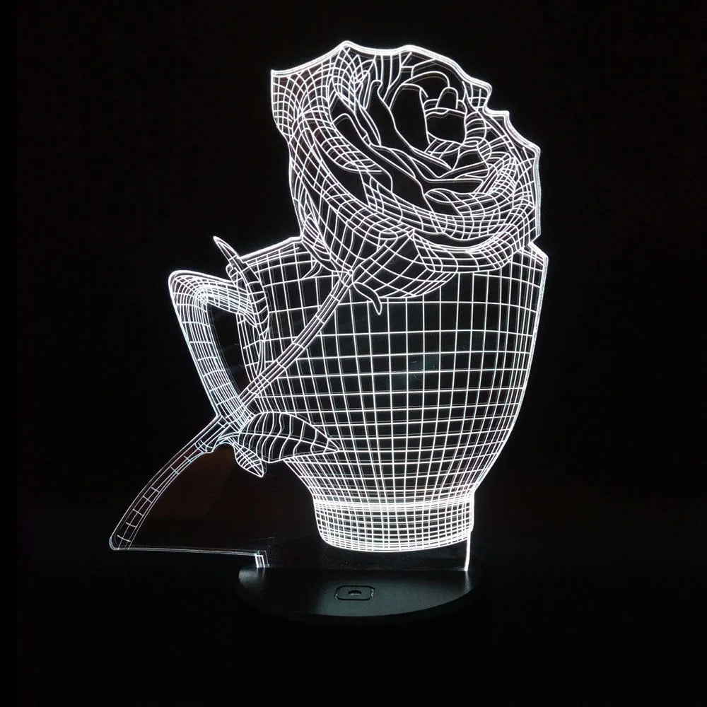A 3D acrylic rose LED night light with a black base, displaying a purple glow, sitting on a wooden surface.