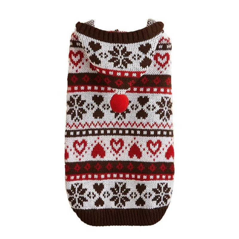 Pink striped camouflage dog sweater with snowflake and heart pattern on a small white dog.