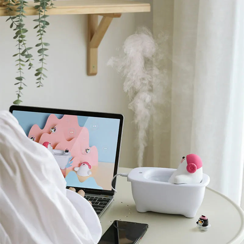 White polar bear-shaped USB desktop humidifier with water tank and mist output