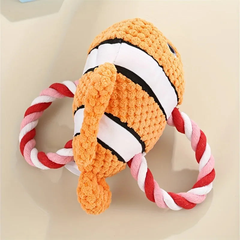 Turtle-shaped dog chewing toy with knot elements in grey green orange colours for medium large dogs