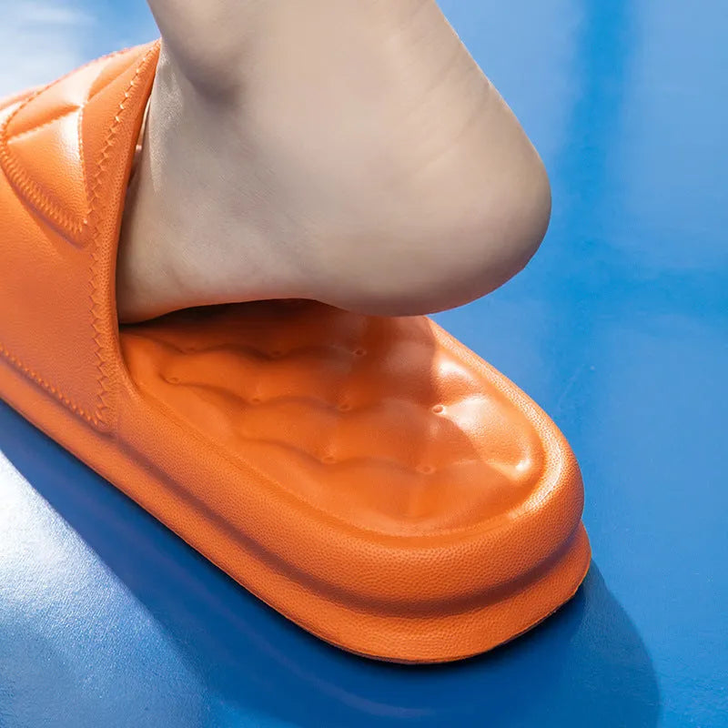 Pair of soft EVA bathroom slippers with a thick non-slip sole, shown in a choice of colours.