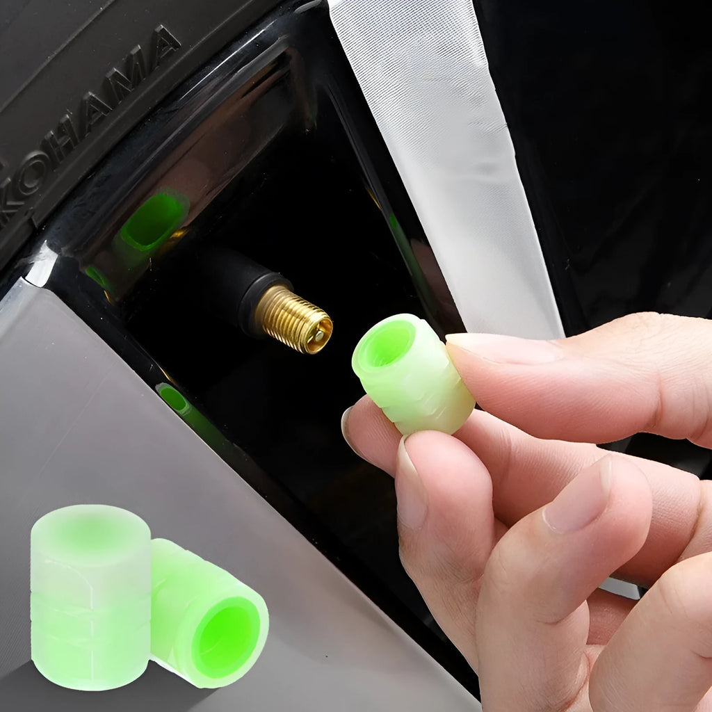 Glow-in-the-dark rubber car tyre valve caps in a set, showing size and luminous feature.