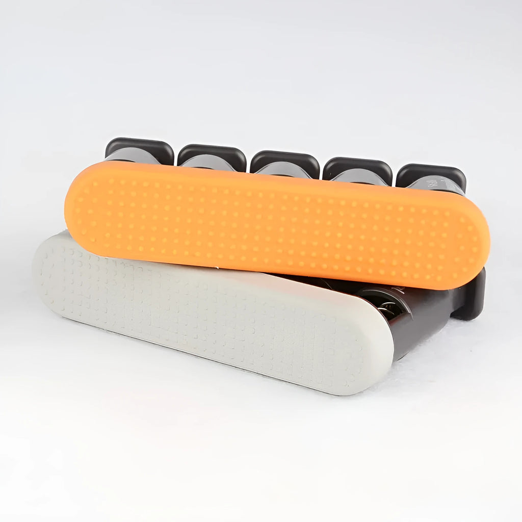 Grey and orange silicone finger trainer for hand muscle development