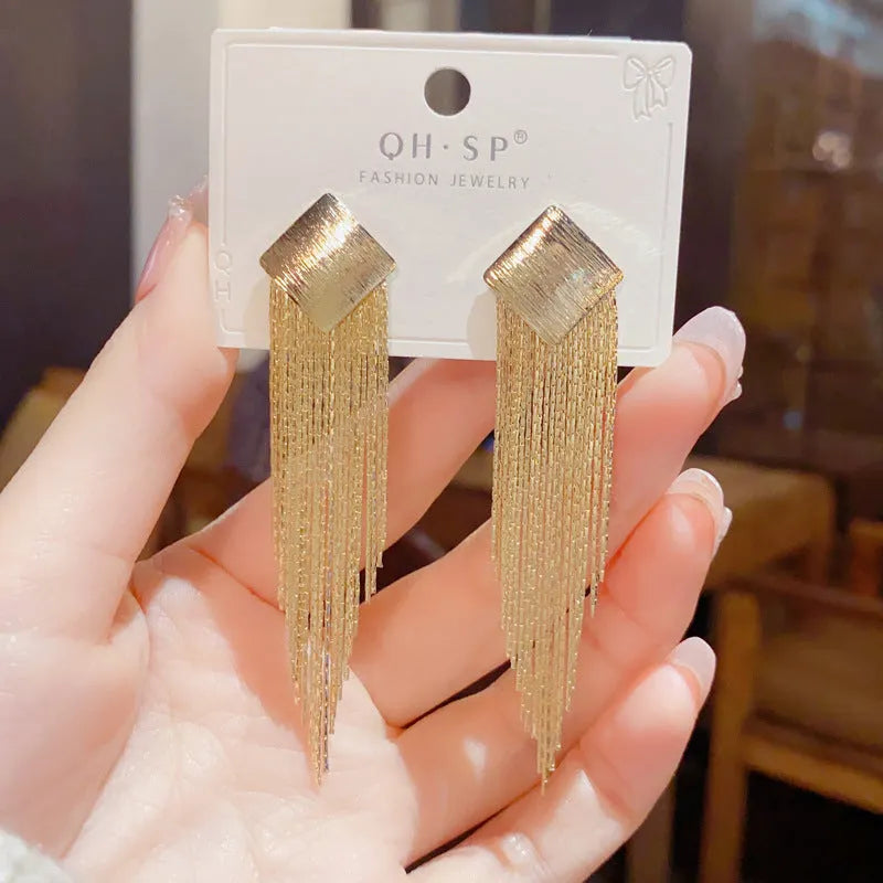 Pair of geometric tassel earrings with electroplated copper finish and real gold colour retention, simple style for women