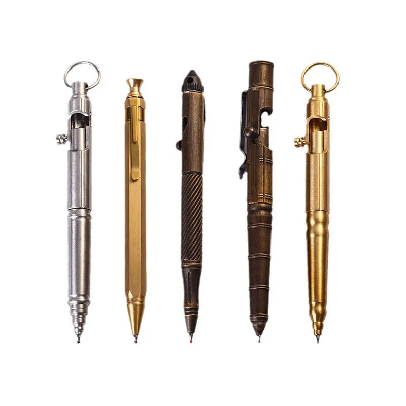 Brass tactical pen with bolt-action mechanism showing brushed finish and retro hole detailing