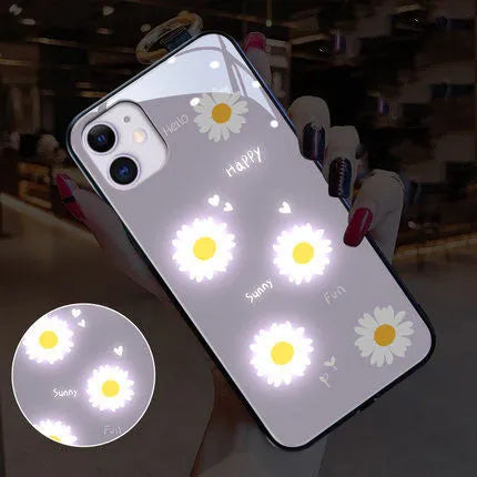 White luminous iPhone case with painted purple daisies and voice-activated colour light feature.