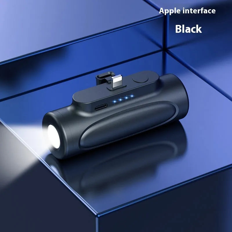 Black and pink portable power bank with integrated LED flashlight, showing Type-C and Apple port options.