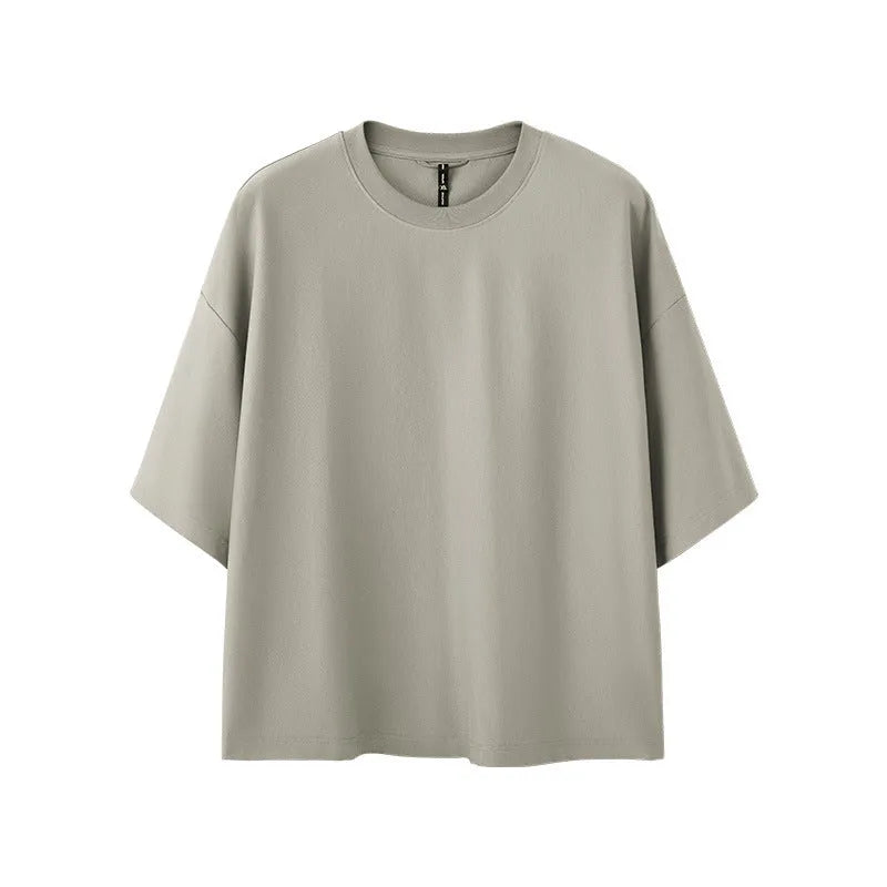 Men's sand grey loose-fit short sleeve t-shirt made from cotton and polyester blend fabric.