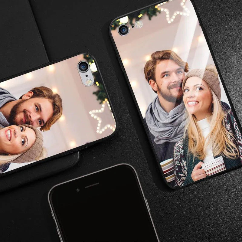 Patterned iPhone case with raised edges on a table next to an iPhone.