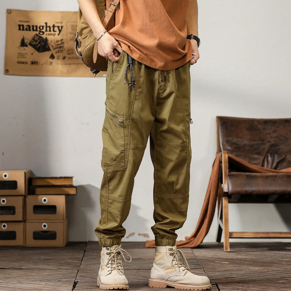 Men's khaki peacock green harem pants with tapered ankle bands and mid-waist design