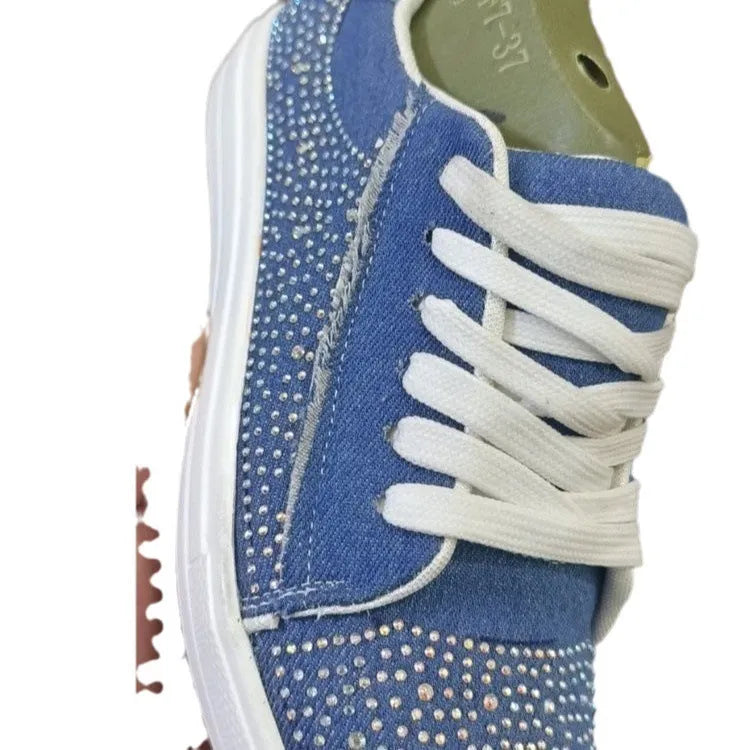 Plus size women's rhinestone casual sports shoes in black with a chunky flat rubber sole and front lace-up.