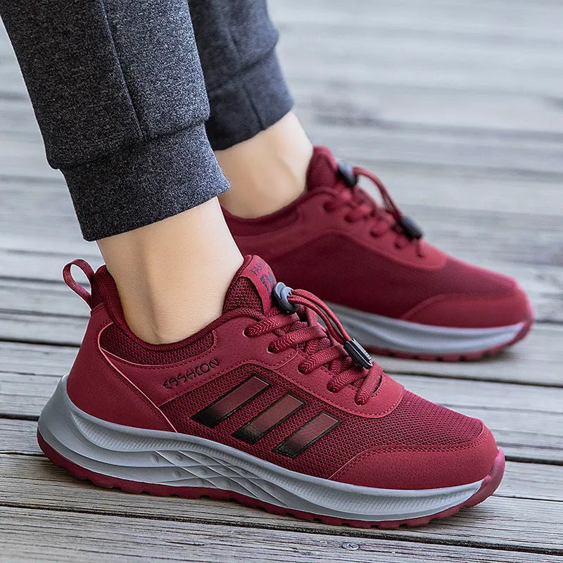 Casual breathable mesh slip-on shoes for men and women with elastic band and non-slip sole.