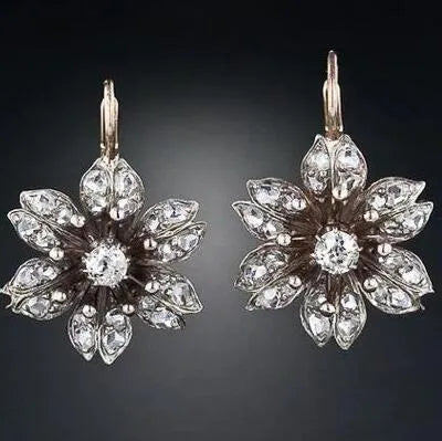 Retro style silver earrings for women with electroplated alloy construction