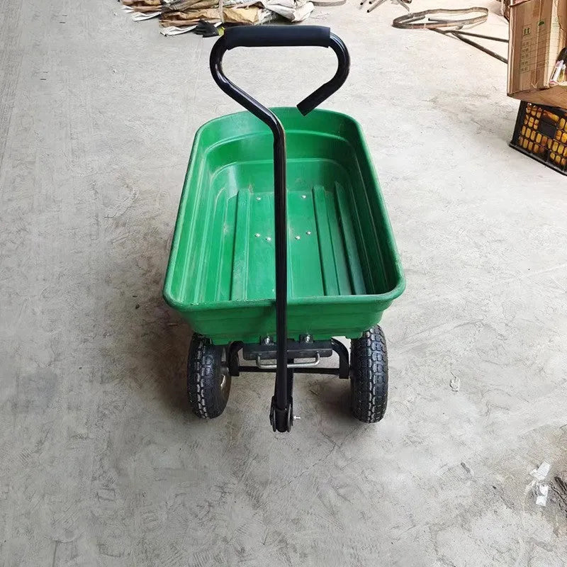 Green four-wheel agricultural dump truck with tipping bed, model TC2145, for hauling materials.