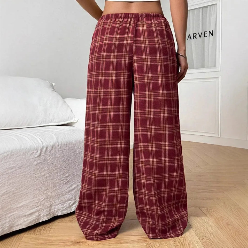 Women's blue and red plaid casual trousers with drawstring waist and side pockets.