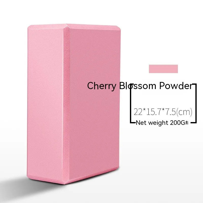 EVA foam yoga block in violet colour, shown next to a pink block, demonstrating its size and rectangular shape for fitness support.
