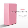 EVA foam yoga block in violet colour, shown next to a pink block, demonstrating its size and rectangular shape for fitness support.