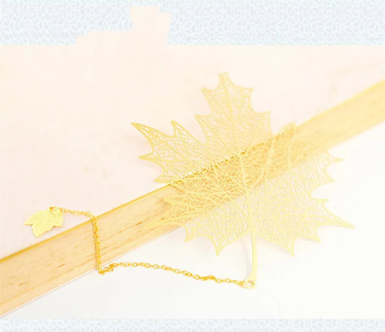 Brass metal bookmark with hollow plating decorative leaf pattern and rose gold tassel