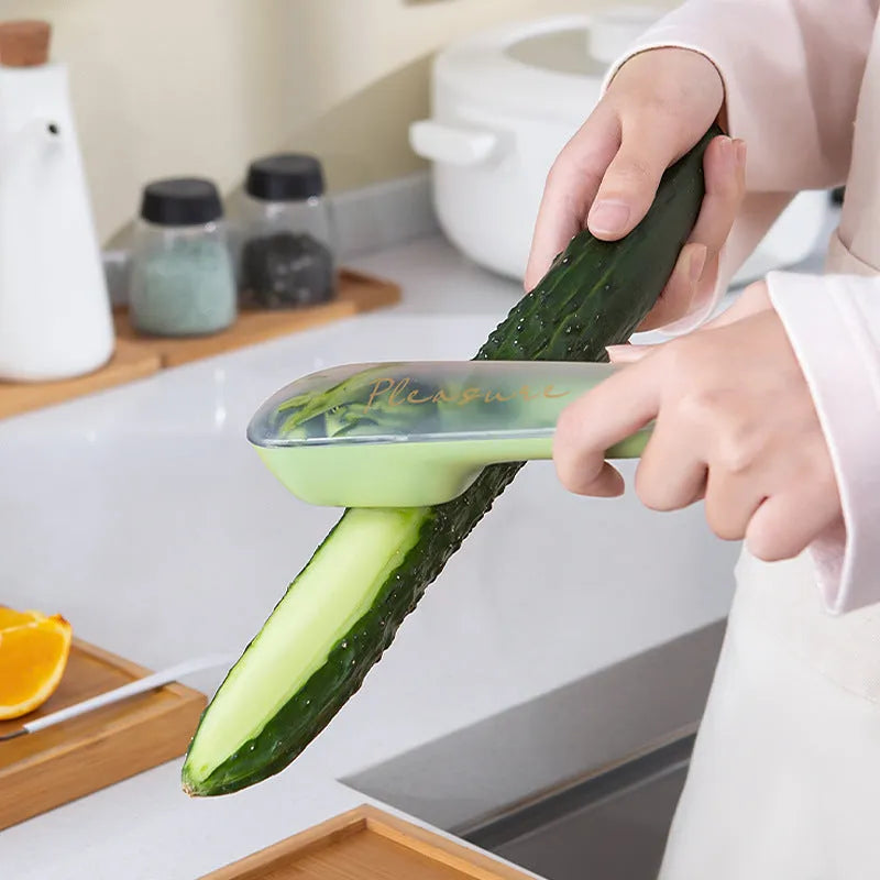 Dark green vegetable peeler with storage tube and stainless steel blade, 20cm length with hanging hole